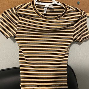 Worn neutral color striped fitted t shirt from H&M